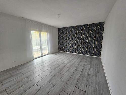 Wohnzimmer - Einfamilienhaus mit 144,00 m² in Hamm zum Kaufen