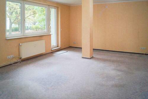 Wohnzimmer - 4 Zimmer Einfamilienhaus zum Kaufen in Bremen