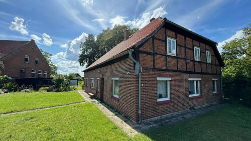 Ansicht hinten / Seitenansicht - 1 Zimmer Mehrfamilienhaus, Wohnhaus in Damnatz