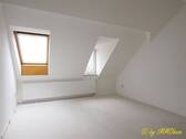 Zimmer im Dachgeschoss - 