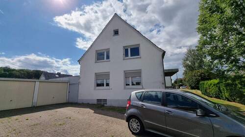 Eingangsansicht - Mehrfamilienhaus, Wohnhaus mit 110,00 m&sup2; in Bünde / Hüffen zum Kaufen