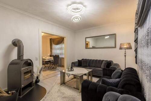 Zimmer 2 WZ mit Kamin - 