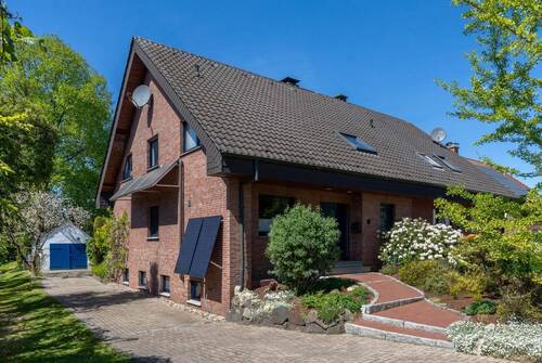 Frontansicht - Familienfreundliche Doppelhaushälfte in ruhiger Lage von Selm mit Wintergarten, Garten und Garage