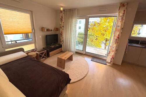 Wohn- und Schlafbereich - 1 Zimmer Etagenwohnung in München
