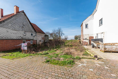 Frontansicht Wohnstraße Innerorts - Grundstück in Hessisch Oldendorf / Welsede