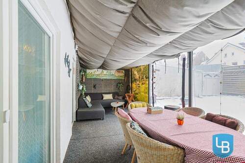 WE1: Überdachte Terrasse - Mehrfamilienhaus, Wohnhaus mit 360,00 m&sup2; in Kiel zum Kaufen