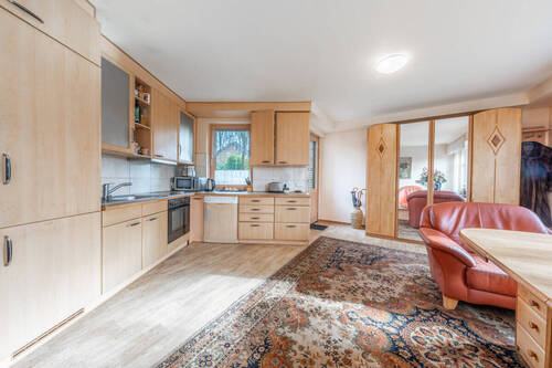 Der offene Wohn-/Küchenbereich der ersten Einheit - 9 Zimmer Mehrfamilienhaus, Wohnhaus zum Kaufen in Ibbenbüren