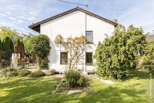 Blick auf das Wohnhaus - Einfamilienhaus mit 240,00 m² in Kirchheim bei München zum Kaufen