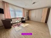 Wohnzimmer OG - 6 Zimmer Mehrfamilienhaus, Wohnhaus zum Kaufen in Norderney