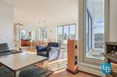 Wohnbereich mit Zugang zur Dachterrasse - 
