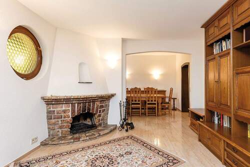 Kamin mit Blick ins Esszimmer - Einfamilienhaus mit 181,10 m&sup2; in Berlin zum Kaufen