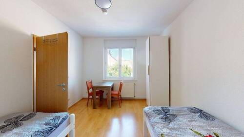 Wohnung 2 OG rechts - Schlafzimmer 2 - 