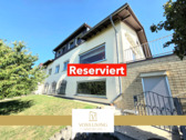 Titelbild Reserviert - Zweifamilienhaus mit Einliegerwohnung, Traumgrundstück, 2 Sonnenterrassen mit Traumblick+2 Garagen