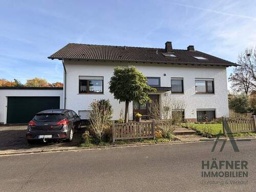 Vorderansicht - 8 Zimmer Einfamilienhaus zum Kaufen in Wolsfeld