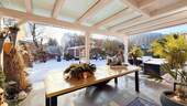überdachte Terrasse mit anschließendem Garten - 