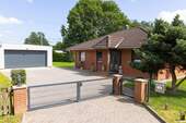 Bild 1 - Charmanter Bungalow von 1997 mit Wintergarten u. großem Grundstück - Wohnen nahe Greifswald