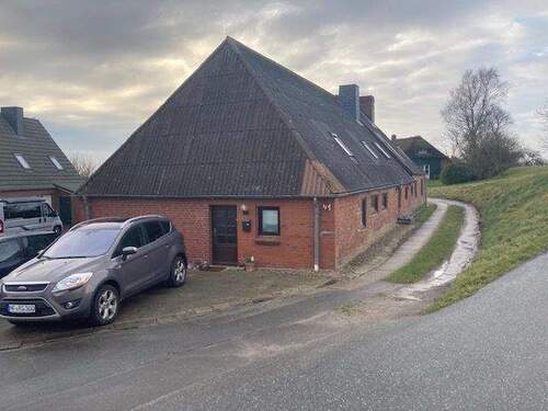 Außenansicht - Wohnen direkt am Deich, in einer neu renovierten 2,5 Zimmer-EG Wohnung, oder eine 3,5 Zimmerwhg.