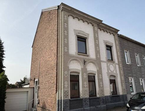 Titelbild - Modernisierungsbedürftiges Einfamilienhaus mit Garage und Sonnengrundstück im Herzen von Bardenberg