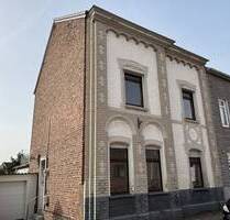 Modernisierungsbedürftiges Einfamilienhaus mit Garage und Sonnengrundstück im Herzen von Bardenberg - Würselen