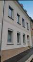 Ansicht.jpg - Reihenmittelhaus mit Einliegerwohnung, teilsaniert, sanierungsbedürftig