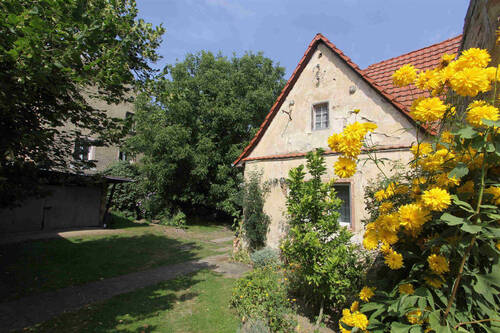 Giebelansicht Bauernhaus - 4 Zimmer Einfamilienhaus zum Kaufen in Querfurt-Weißenschirmbach