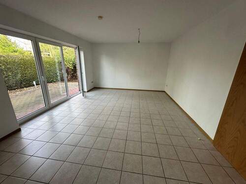 Wohnzimmer - 5 Zimmer Doppelhaushälfte in Rhauderfehn