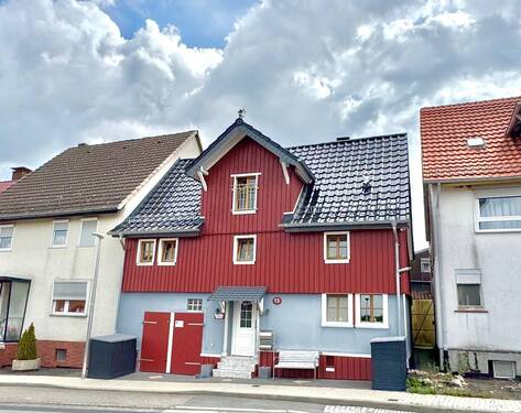 Ansicht (2) - 7 Zimmer Doppelhaushälfte in Calden