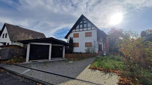 Außen - Straßenseite - 8 Zimmer Mehrfamilienhaus, Wohnhaus zum Kaufen in Großkrotzenburg