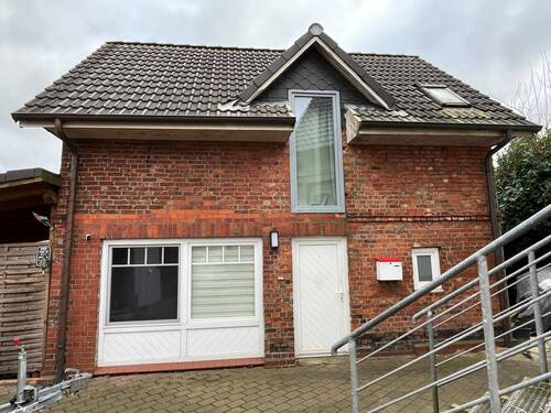 Außenansicht_Anbau - Vermietetes Mehrfamilienhaus mit 2 Wohneinheiten in Drochtersen