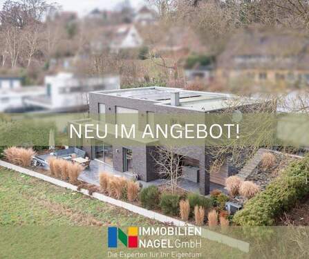 NEU IM ANGEBOT! - Architektenbungalow mit Split-Level-Bauweise, klarer Formensprache und freiem Landschaftsblick!
