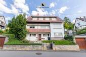 Außenaufnahme - Renovierungsbedürftiges Zweifamilienhaus mit großem Grundstück und Garagen in Malmsheim zu kaufen
