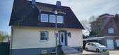 Hausansicht Straßenseite 1 - 7 Zimmer Mehrfamilienhaus, Wohnhaus zum Kaufen in Peine