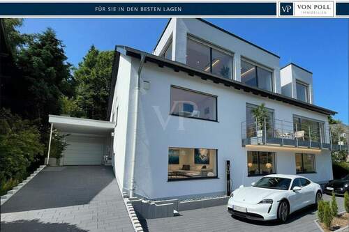 Titelbild - Wohnen auf höchstem Niveau - Stilvolles Einfamilienhaus mit einmaligem Blick, Kamin, Garten