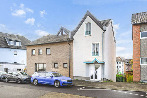 Titelbild - Teil vermietetes Zweifamilienhaus mit Apartment und Garage