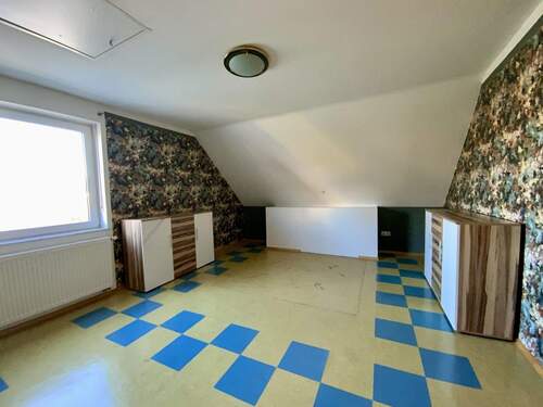 Schlafzimmer im Dachgeschoss - 
