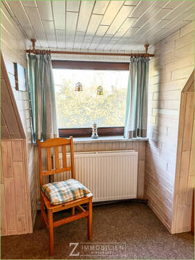 Zimmer II mit Blick in den Garten - 