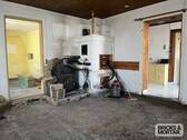 Wohnzimmer - 9 Zimmer Mehrfamilienhaus, Wohnhaus zum Kaufen in Buttenwiesen