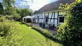 Gartenansicht mit Terrasse - 5 Zimmer Einfamilienhaus zum Kaufen in Olpe