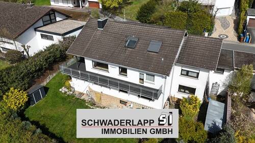 Rückansicht - Attraktives Mehrfamilienhaus mit flexibler Nutzung und Zukunftspotenzial