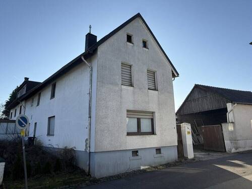 Hauptansicht - Einfamilienhaus als Wohnungseigentum