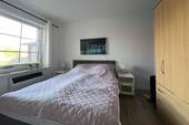 24409001_1-Schlafzimmer.jpg - 2 Zimmer Etagenwohnung in Brodersby