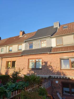 seitliche Rückansicht.jpg - Reihenmittelhaus mit 91,00 m² in Nortorf zum Kaufen