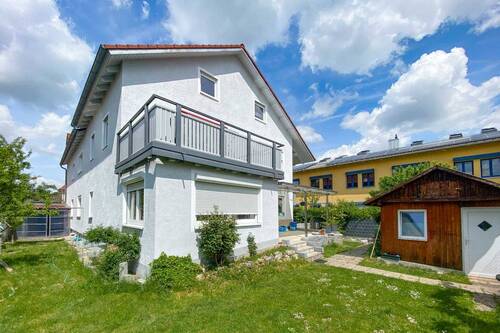 Außenansicht - ?? Hausgefühl inklusive: Großzügige Erdgeschosswohnung mit Garten und separater Nutzfläche
