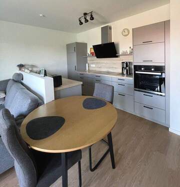 Wohnzimmer - Terrassenwohnung mit 70,70 m² in Stade zur Miete