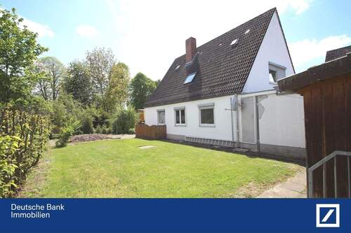 Bild 1 - Drei Wohnungen und große Lagerhalle mit schönem Garten und Garage!