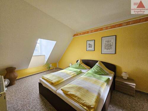 Schlafzimmer Ferienwohnung DG - 