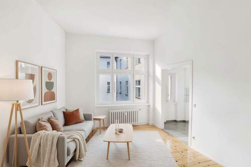 Wohnzimmer (KI generiert) - 2 Zimmer Etagenwohnung zum Kaufen in Berlin