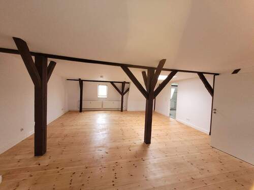 Einblick Wohnbereich mit offener Küche Bild 3 - 