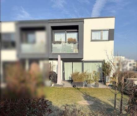 Gartenansicht - Charmantes Reiheneckhaus in bevorzugter Wohnlage!