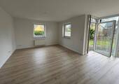 Wohnzimmer unmöbliert - Doppelhaushälfte mit 130,00 m&sup2; in Busdorf zum Kaufen